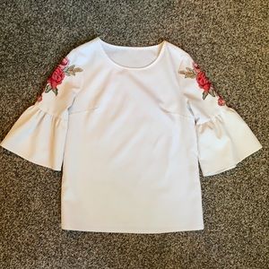5/$22 women’s blouse with rose detail